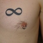 In this first image we see how this guy has chosen to only Tatura infinity symbol on an average size just above his chest.